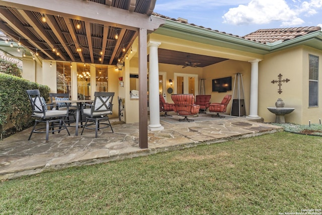 view of patio with ceiling fan and french doors