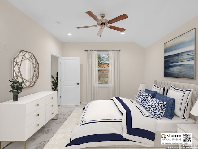 bedroom with vaulted ceiling and ceiling fan