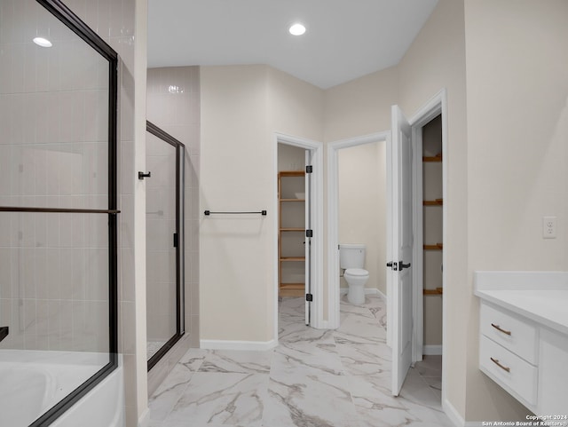 full bathroom featuring vanity, toilet, and independent shower and bath