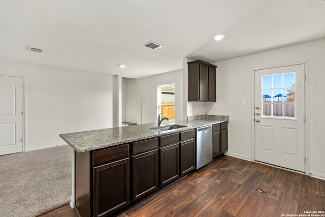 kitchen featuring dishwasher, kitchen peninsula, sink, and a wealth of natural light