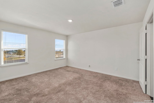 view of carpeted spare room