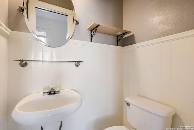 bathroom with toilet and sink