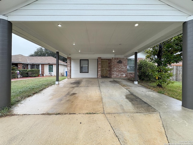 view of patio / terrace featuring a carport