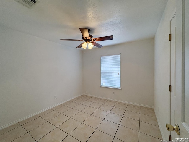 view of tiled spare room