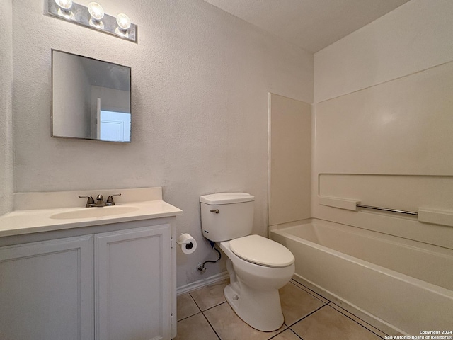 full bathroom featuring toilet, bathtub / shower combination, vanity, and tile patterned floors