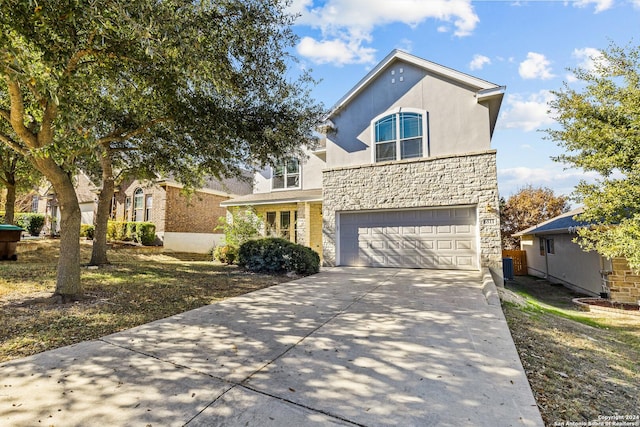 view of front of property featuring a garage