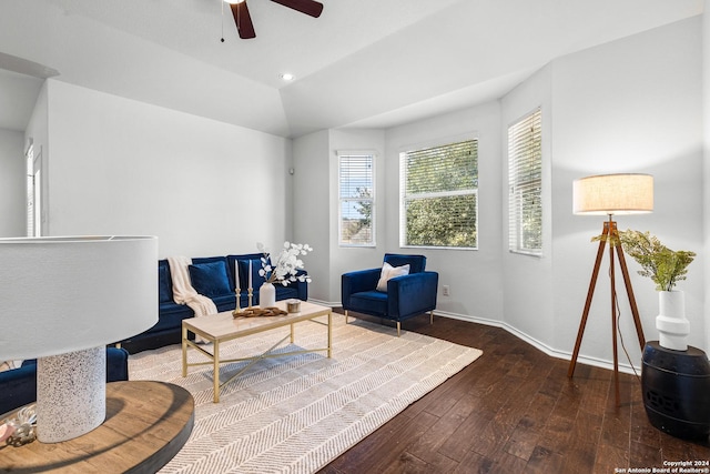 sitting room with lofted ceiling, ceiling fan, and dark hardwood / wood-style flooring