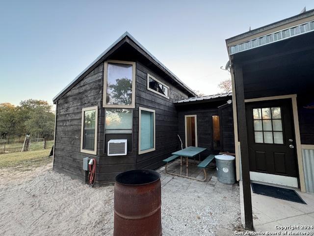 rear view of house with a patio area