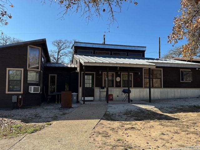 view of front of property featuring cooling unit