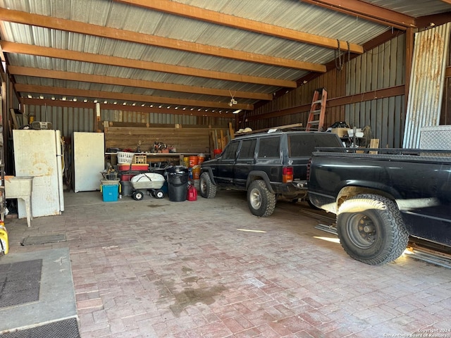 garage with white refrigerator