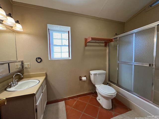 full bathroom with tile patterned floors, vanity, toilet, and ornamental molding