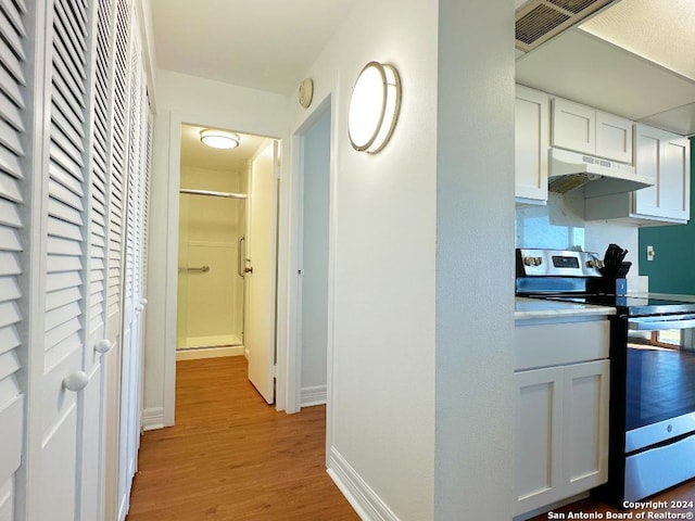 hallway featuring light hardwood / wood-style floors