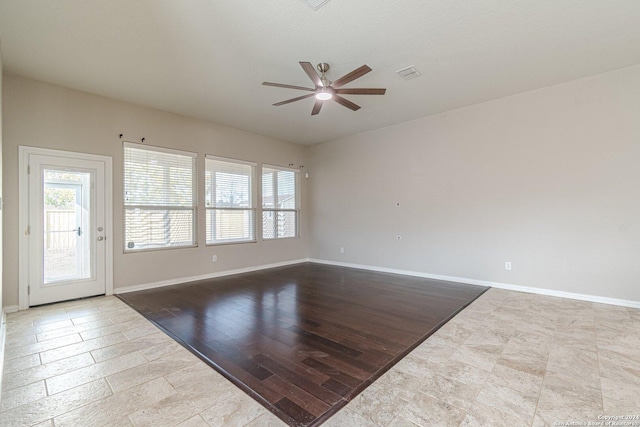 unfurnished room featuring ceiling fan and light hardwood / wood-style floors