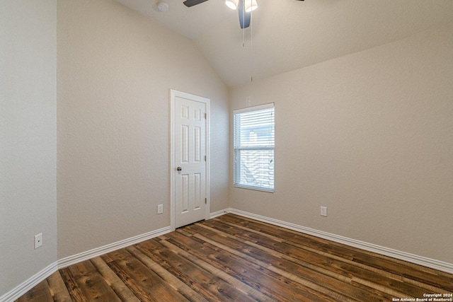 unfurnished room with dark hardwood / wood-style flooring, ceiling fan, and lofted ceiling