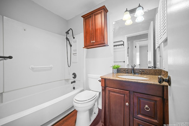 full bathroom featuring wood-type flooring, vanity, bathing tub / shower combination, and toilet