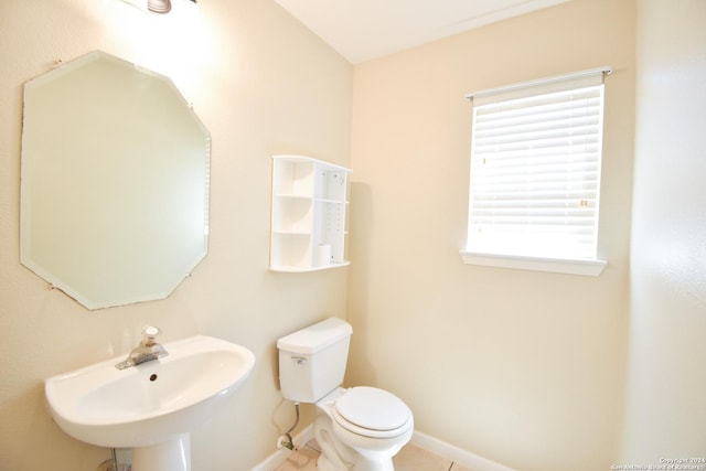 bathroom with toilet and sink