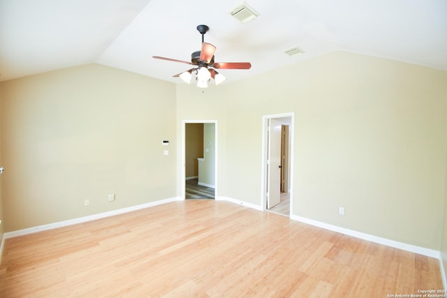 spare room with ceiling fan, light hardwood / wood-style floors, and lofted ceiling