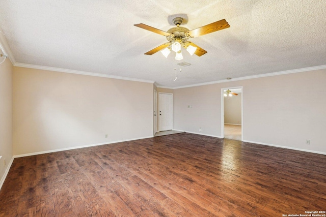 empty room featuring ceiling fan, dark hardwood / wood-style flooring, a textured ceiling, and ornamental molding