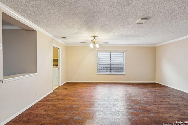 empty room with crown molding, dark hardwood / wood-style flooring, ceiling fan, and washer / dryer