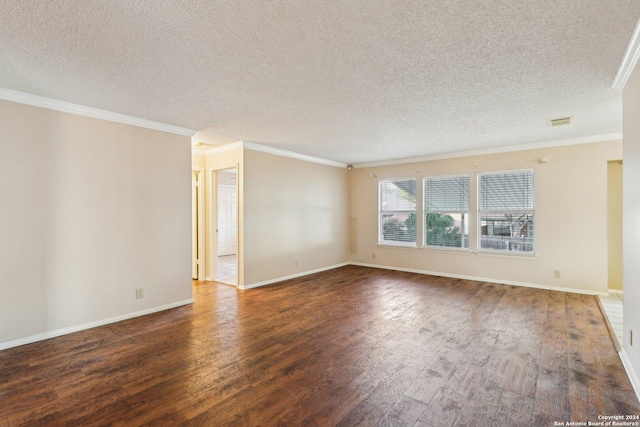 unfurnished room with a textured ceiling, ornamental molding, and dark wood-type flooring