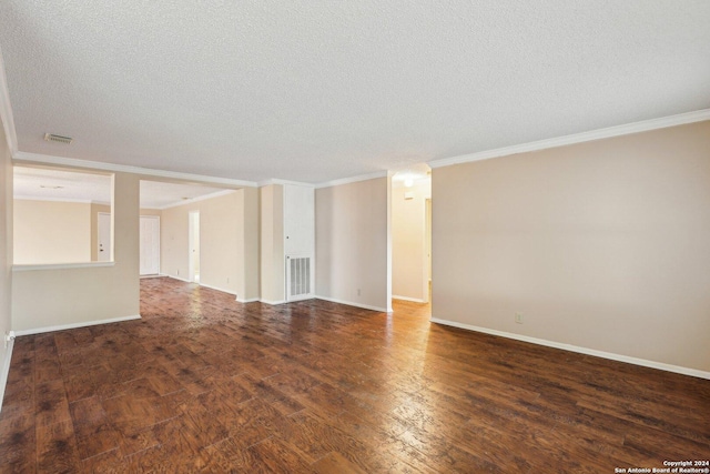 empty room featuring crown molding, dark hardwood / wood-style flooring, and a textured ceiling