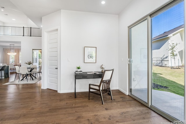 office with dark wood-type flooring