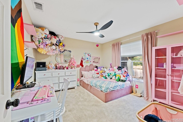 bedroom with light carpet and ceiling fan