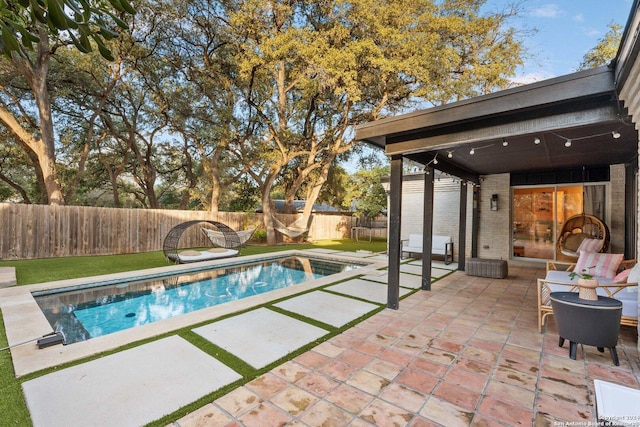 view of pool with a patio