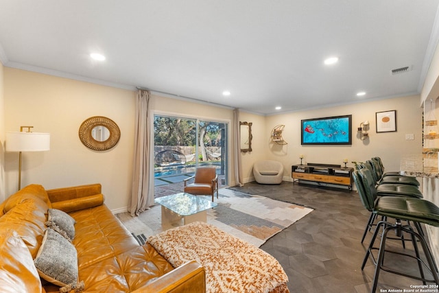 living room featuring crown molding