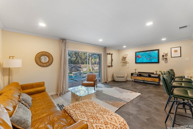 living room with ornamental molding