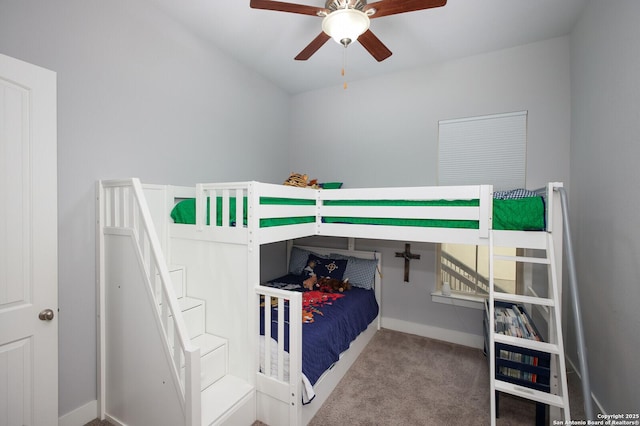 bedroom featuring ceiling fan and carpet floors