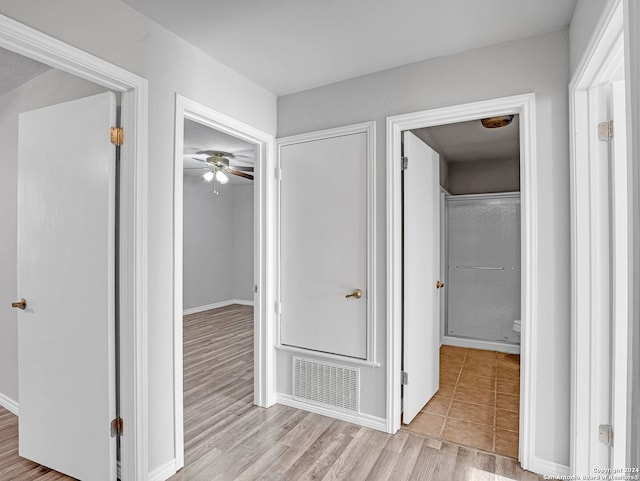 hallway featuring light hardwood / wood-style floors