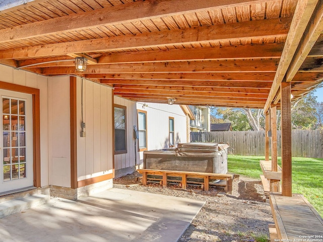 view of patio / terrace with a hot tub