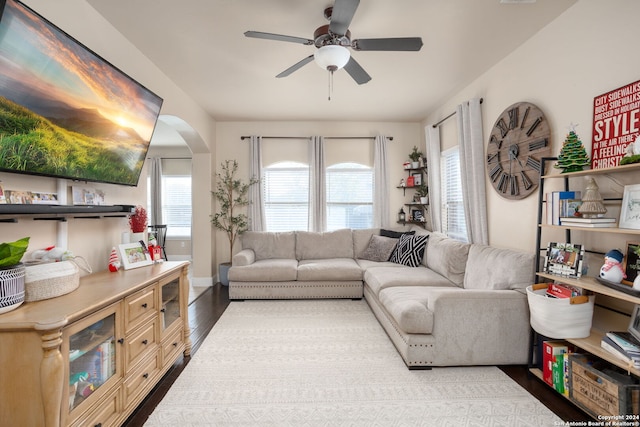 living room with ceiling fan and light wood-type flooring