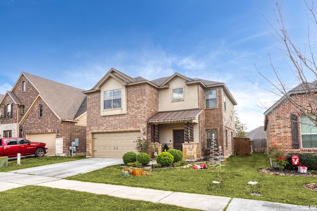 view of front of house featuring a front yard and a garage