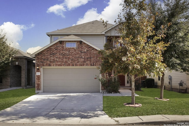 view of front of home featuring a garage and a front yard