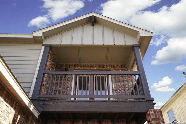 view of side of property featuring a deck