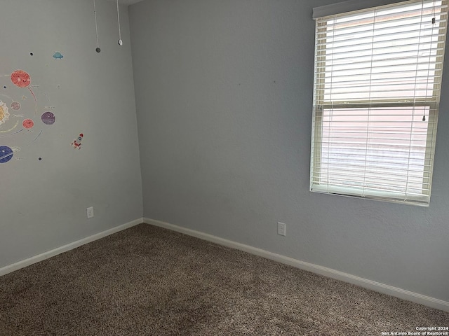 view of carpeted spare room