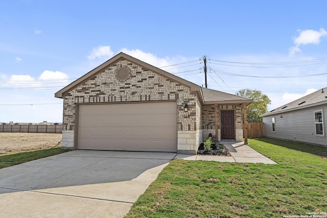 single story home with a front lawn and a garage