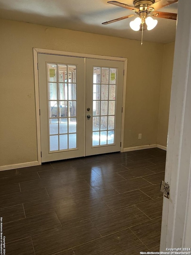 entryway with ceiling fan and french doors