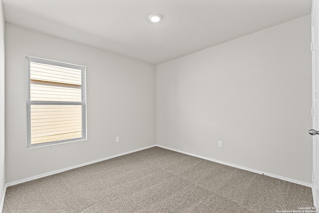 spare room with carpet flooring