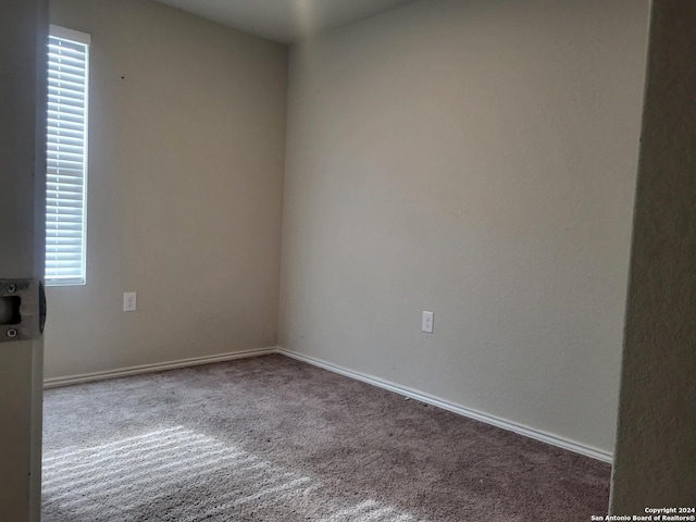 empty room with carpet floors