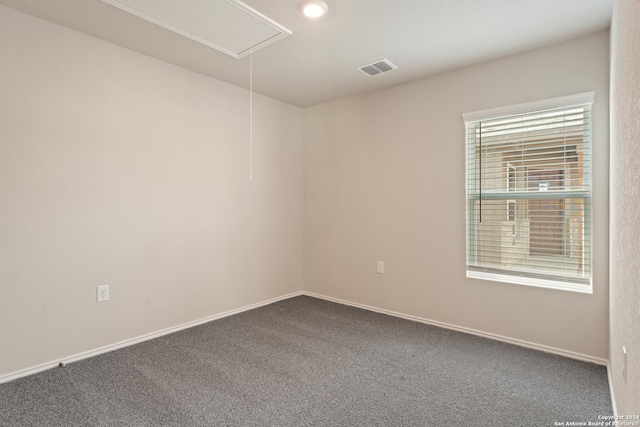 unfurnished room featuring carpet flooring