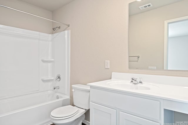 full bathroom with vanity, bathtub / shower combination, and toilet