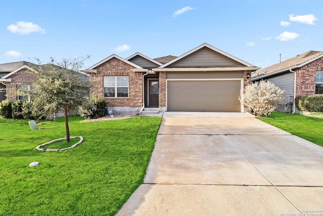 view of front of house featuring a garage and a front lawn