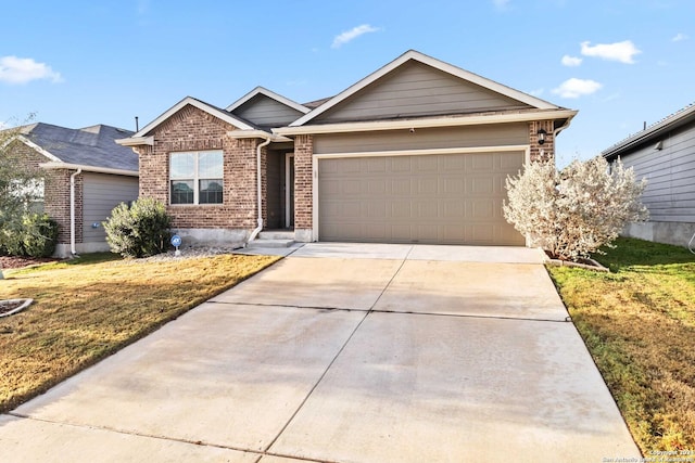 ranch-style home with a garage and a front lawn