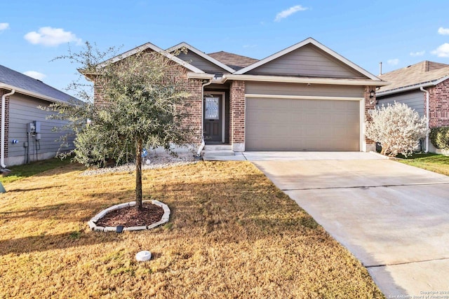 view of front of house with a garage and a front lawn