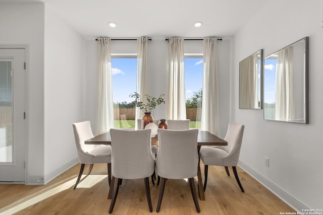 dining room featuring light hardwood / wood-style flooring