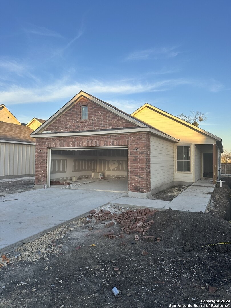 view of front of property with a garage