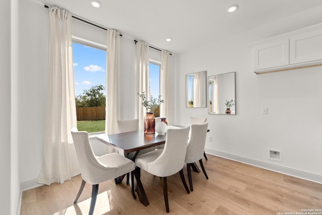 dining room with light hardwood / wood-style flooring